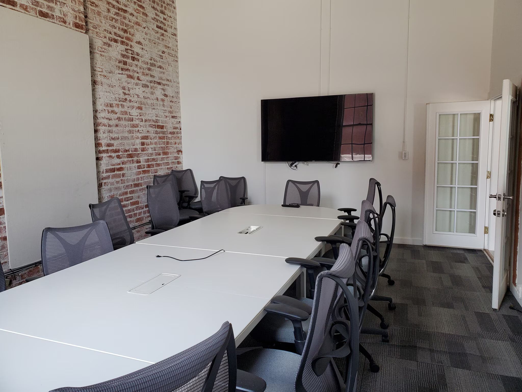 Creative Workspace with Exposed Brick in Design District